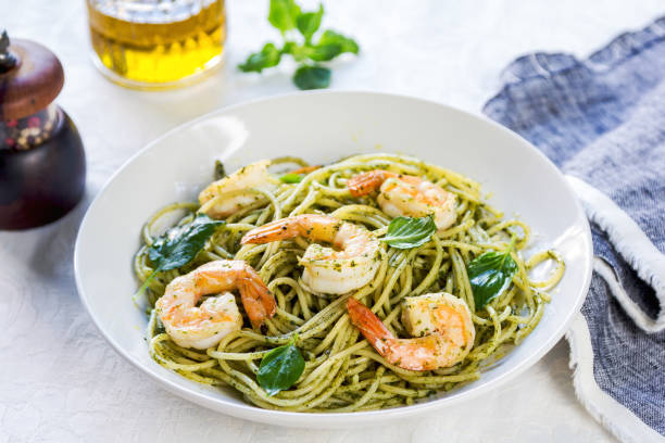 istock Spaghetti with Prawn in homemade Pesto sauce 801693708