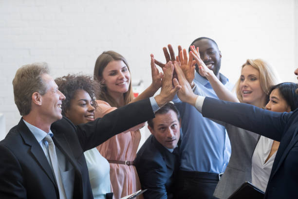istock Business Team Giving High Five, Successful Businesspeople Group Cheering In Modern Office Coworkers Celebration Success 801703552