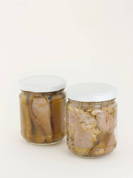 istock Homemade tuna jars on a white background 801703692