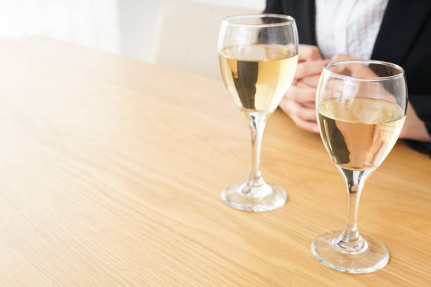 istock Woman drinking Alcoholics with suit 801706626