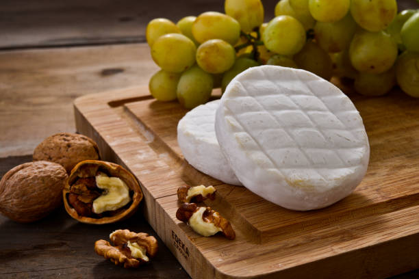 Italian tomino cheese stock photo