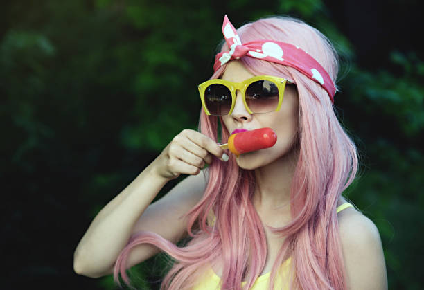 istock Hipster girl eating ice cream 801725534