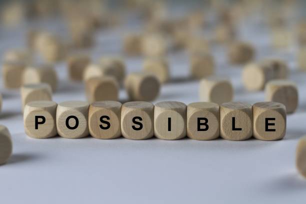 istock possible - cube with letters, sign with wooden cubes 801734950