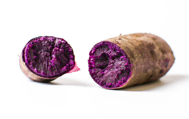Cooked purple potato isolated on white background