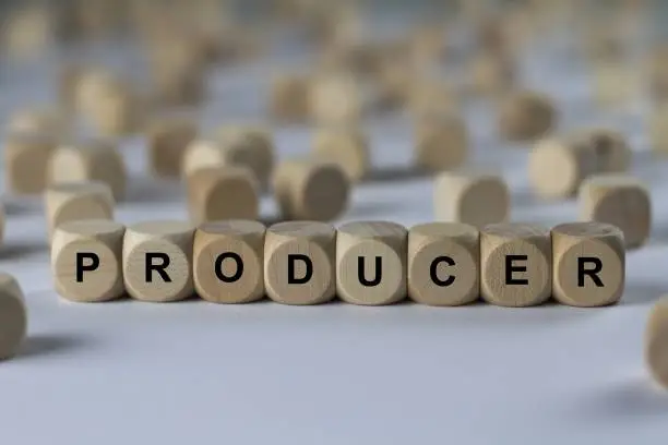 Photo of producer - cube with letters, sign with wooden cubes