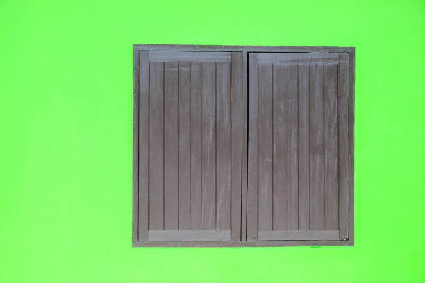 istock wooden window in colorful wall 801744014