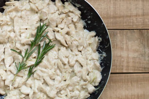 istock Chicken stroganoff with rosemary plant 801744052