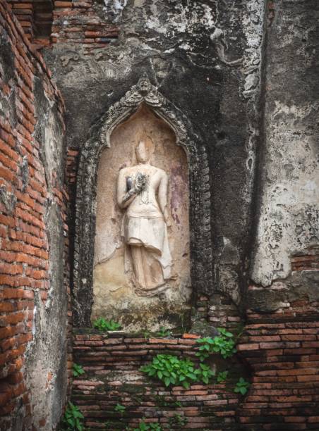 istock Ancient Buddha Statue Wall At 
