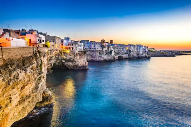 Puglia, Italy. Sunset scenery of Polignano a Mare, town in the province of Bari, Apulia, southern Italia on the Adriatic Sea