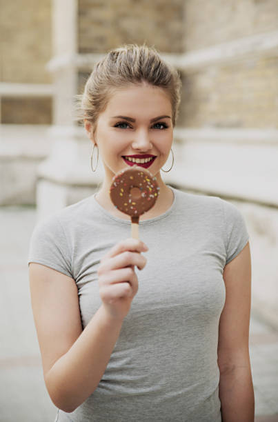 istock Girl with chocolate ice cream 801765122