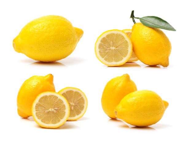 istock Fresh lemons with leaves on the white background 801779786