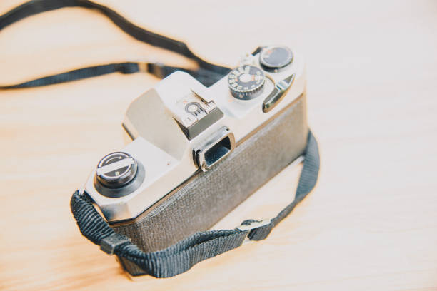 Vintage camera on wooden background