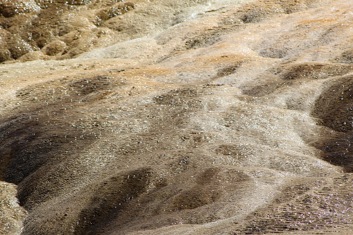 The water kind of pulsed over the rock. Mammoth Hot Springs Yellowstone. Canon T5 camera on 6/21/17.