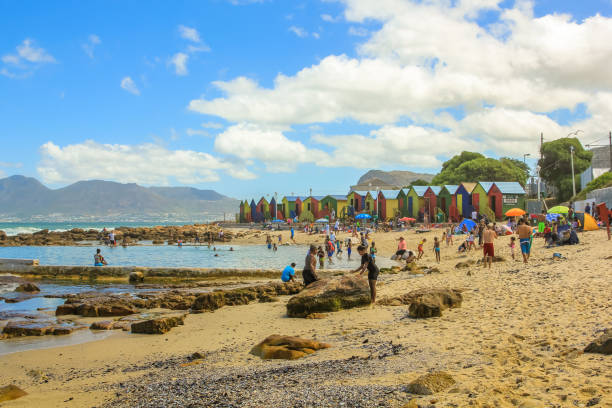 muizenberg beach south africa - cape town beach crowd people imagens e fotografias de stock