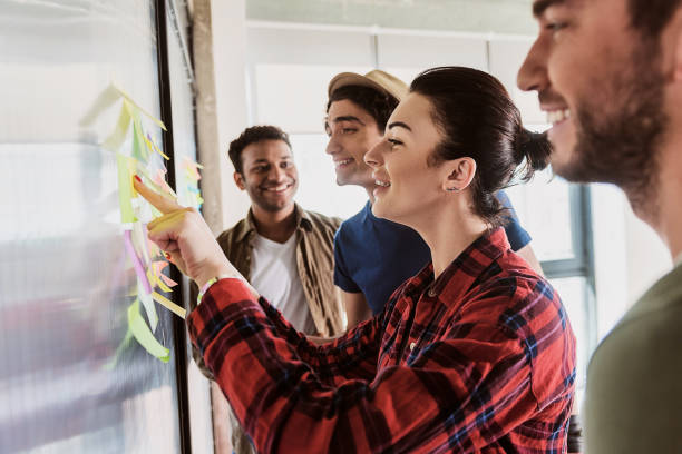 istock Joyful team creating new ideas near glass board 801853480