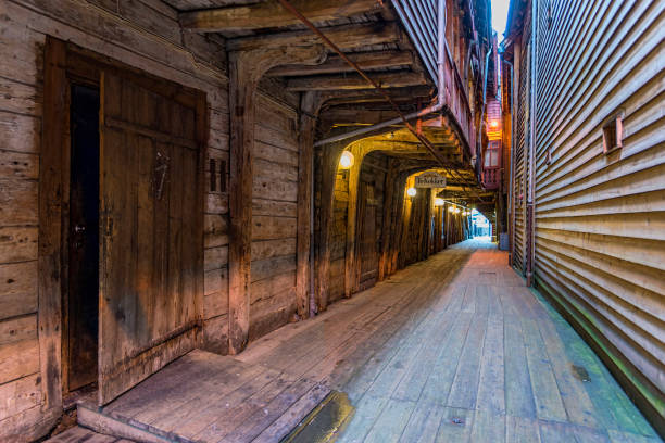 Bergen, Norway - August 14, 2016: A Narrow passage in the Bryggen district. Is a series of Hanseatic commercial buildings that has since 1979 been on the UNESCO list for World Cultural Heritage sites