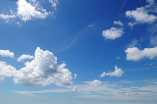 istock blue sky and white cumulus clouds 801872160