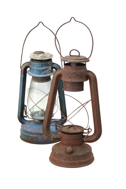 istock Old antique kerosene lanterns on a white background 801895600