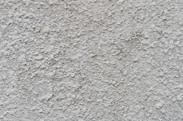 istock Cracked old gray cement concrete stone wall vintage dirty texture background 801905714