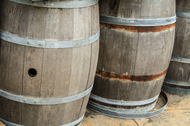 istock Old wooden barrels and tanks for processing wine 801906198