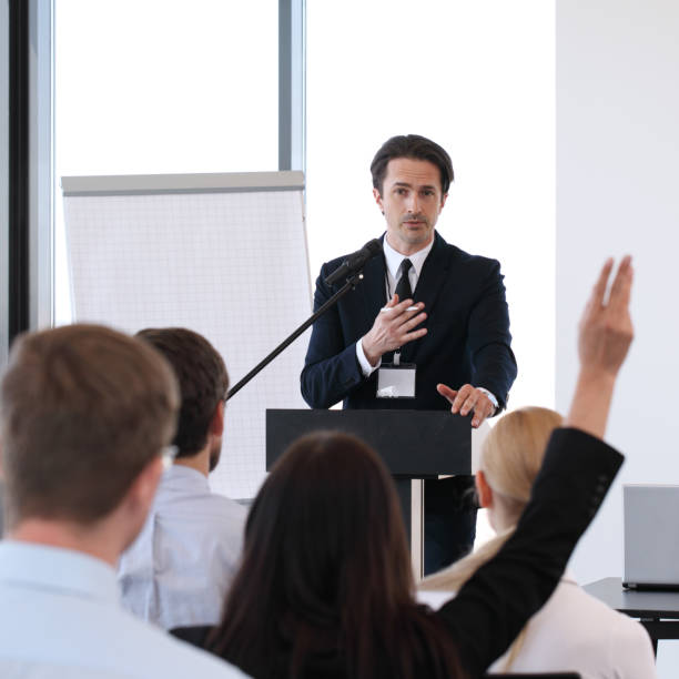 istock Speakers at business meeting 801911108
