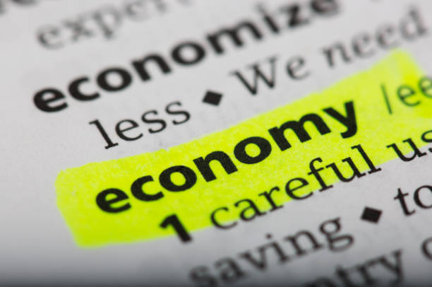 istock Word economy printed and defined in a English dictionary 801924500