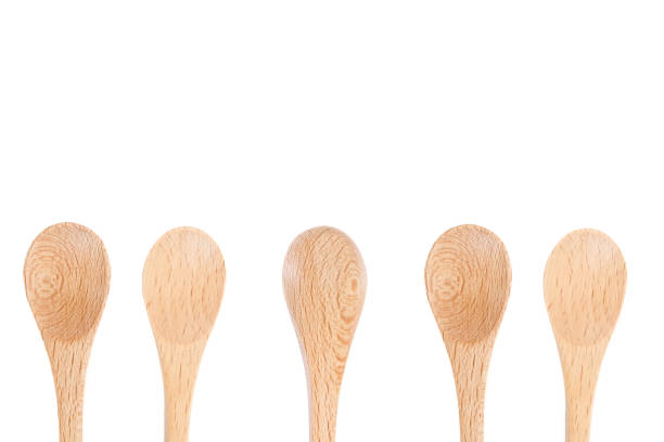 istock Wooden spoon on isolated background 801939144