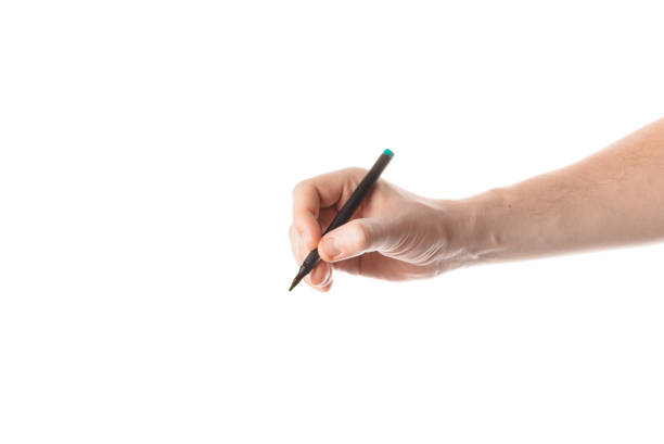 istock Male hand writing with the marker or felt pen. Isolated on white 801948328