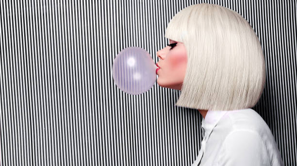 Cheerful young girl Cheerful young girl in white wig and white shirt on black background in pink peas, circles. Kiss, love, bright lips. happy green peas stock pictures, royalty-free photos & images