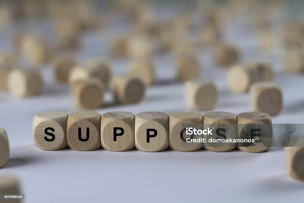 suppose - cube with letters, sign with wooden cubes series of images: cube with letters, sign with wooden cubes Abstract Stock Photo