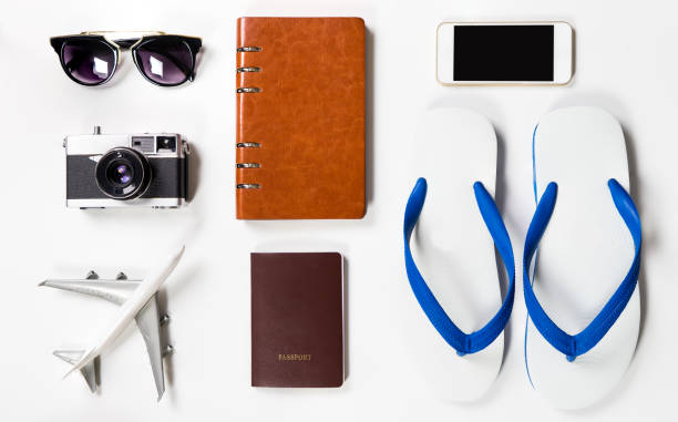 istock Summer Beach Vacation travel equipment on white background 801958682