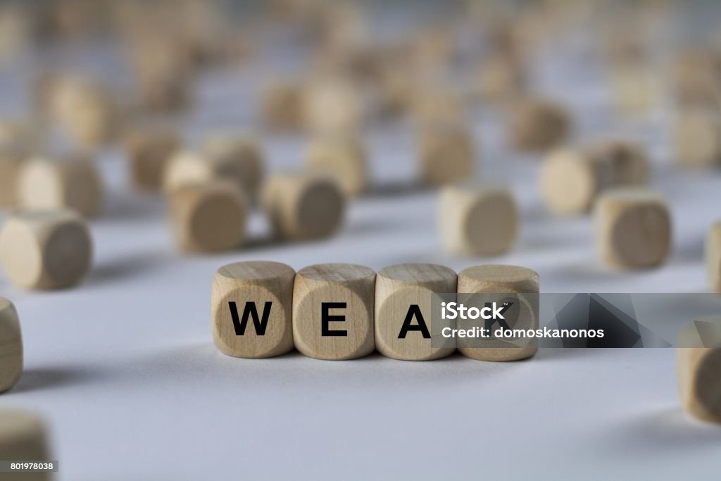 weak - cube with letters, sign with wooden cubes series of images: cube with letters, sign with wooden cubes Abandoned Stock Photo