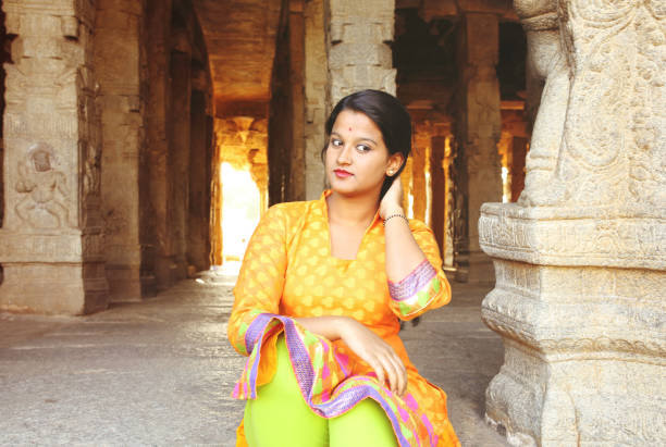 istock Female Sitting in the Temple Premises 801982536