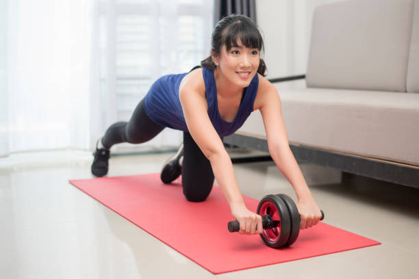istock sporty woman  do abdominal exercises 802004652