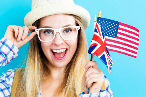 istock Woman with flags of English speaking countries 802004702