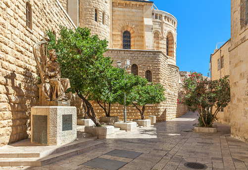 Jerusalem: Sculpture of King David playing harp near entrance to his tomb on Mount Zion. This is also the place believed by Christians of the Last Supper of Jesus.