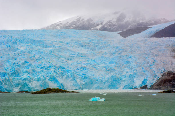 El Brujo Glacier in Asia Fjord, Southern Patagonia, Chile View of the El Brujo Glacier in Asia Fjord, Southern Patagonia Icefield, Chile, South America beagle channel photos stock pictures, royalty-free photos & images