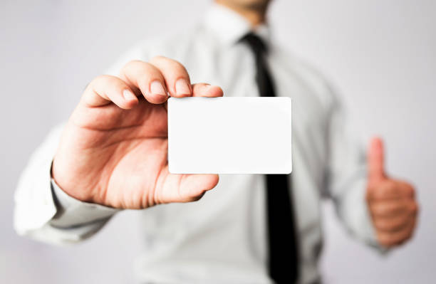 istock Businessman Showing His Blank Vcard With Available Copy Space 802008352