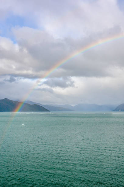 Beautiful view of the rainbow between Beagle Channel, Chile Beautiful landscape view from of the rainbow between Beagle Channel, Asia Fjord, Southern Patagonia, Chile beagle channel photos stock pictures, royalty-free photos & images
