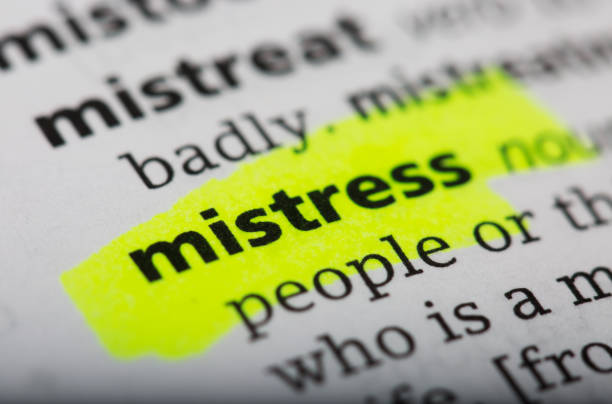 istock Word mistress printed and defined in a English dictionary 802030772
