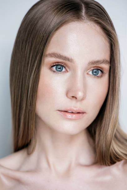 istock Beautiful woman face close up studio 802058482