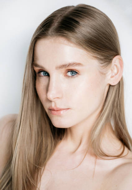 istock Beautiful woman face close up studio 802058524