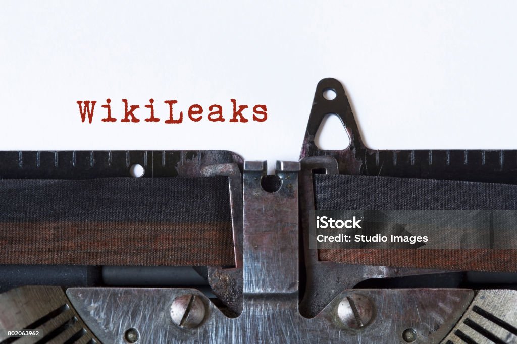 WikiLeaks WikiLeaks written on a vintage typewriter Julian Assange Stock Photo