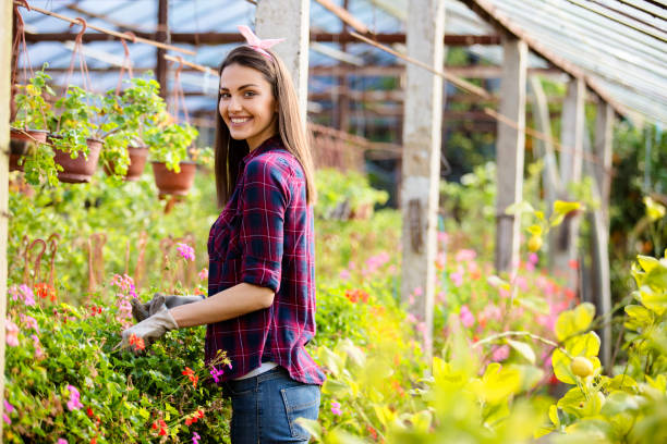 istock Young female florist 802076662