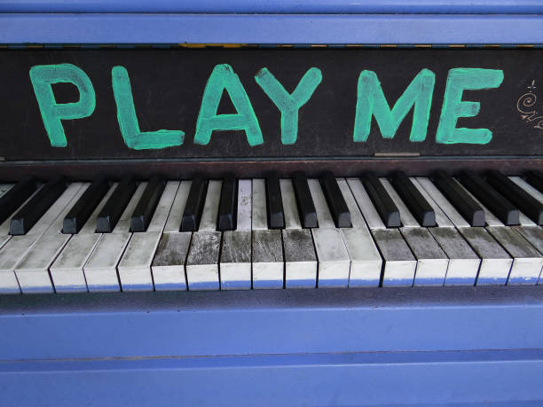 Play Me lonely old piano stock photo