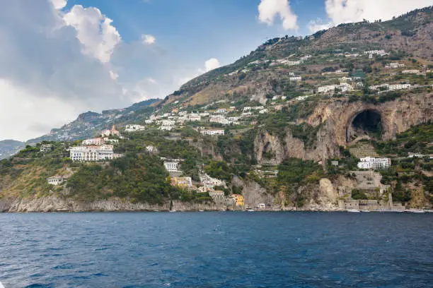 View of Conca dei Marini village on Amalfi coast seen from the sea, Campania, Italy