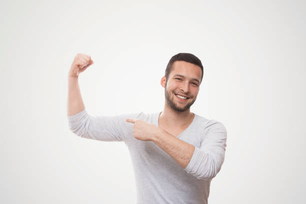 Flexing muscles stock photo