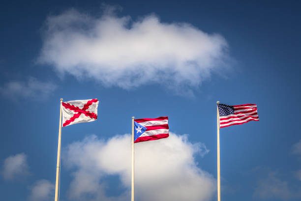 american flag, puerto rico flag, and spanish empire flag - spain flag built structure cloud imagens e fotografias de stock