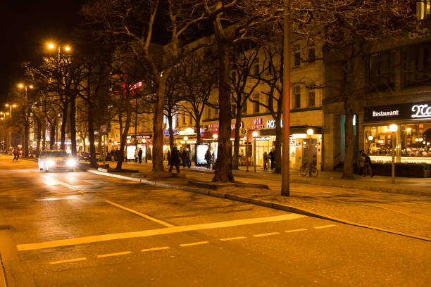 Shops and cafe on Monkebergstrasse, Hamburg, Germany. The Monkebergstrasse is one of the main shopping streets in Hamburg. There are large department stores, fashion boutiques and small retail businesse here.