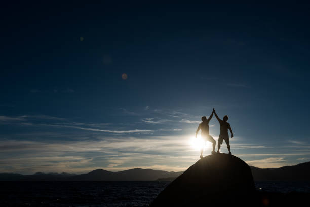 istock Success on top of a mountain 802124306